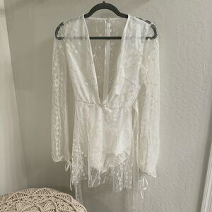 Lucy in the sky brand- white sequin romper/bodysuit. Size small. Only worn once